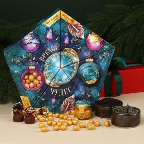 Подарочный набор «Время чудес»: чай чёрный 20 г., арахис в белой шоколадной глазури 70 г., трюфель 100 г., крем-мёд с апельсином 30 г.
